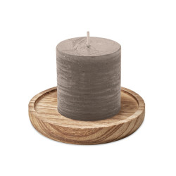 Candle on round wooden base